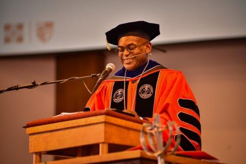 President Hayles smiles down while giving his address at inauguration.